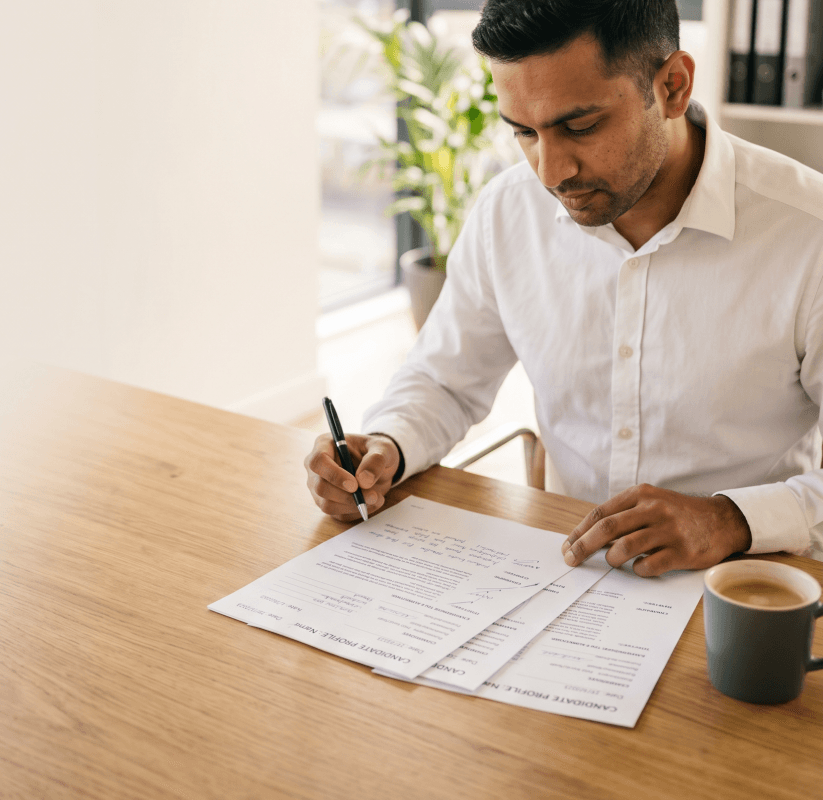 Recruiter reviewing candidate profiles